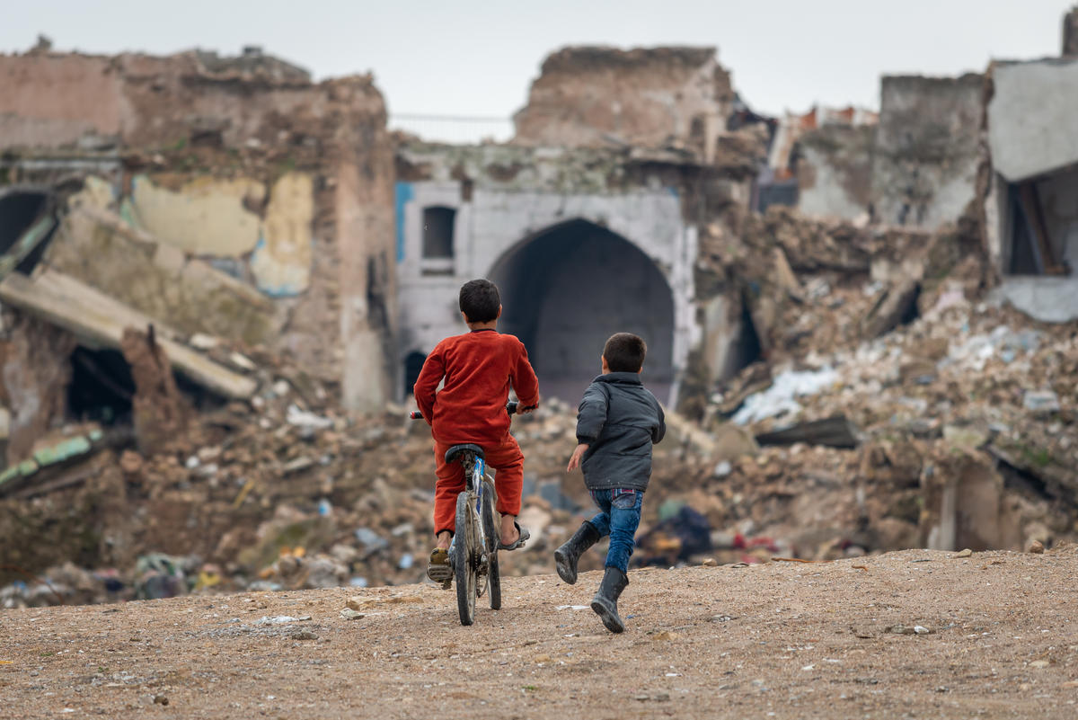Children play amongst the ruins of Mosul's Old City, which was heavily bombed in the battle to retake the city from Islamic State control.