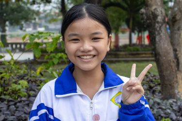 Pige i park i Vietnam